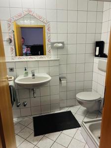 Koupelna v ubytování Landhaus Magnus