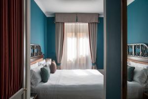 La Posta Hotel & Thermal Spa客房内的一张或多张床位