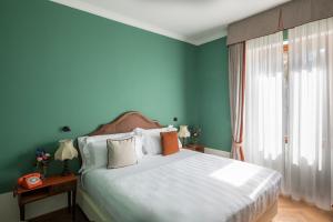 La Posta Hotel & Thermal Spa客房内的一张或多张床位