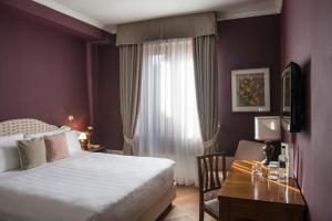 La Posta Hotel & Thermal Spa客房内的一张或多张床位