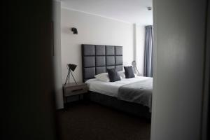 Łóżko lub łóżka w pokoju w obiekcie Lofft Hotel