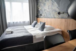 Łóżko lub łóżka w pokoju w obiekcie Lofft Hotel