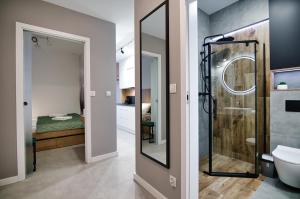 Ένα μπάνιο στο Apartament LOFT w Lagunie Beskidów +24 φωτογραφίες