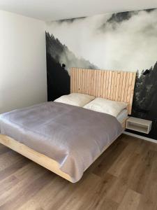 Postel nebo postele na pokoji v ubytování Chalet Aria