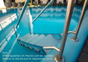 Bazén v ubytování Sonnenstube - Westbalkon, Ruhige Lage, Sauna, Pool, Seenähe, Dachterrasse nebo v jeho okolí