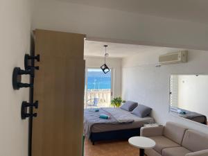 Postel nebo postele na pokoji v ubytování Apartmány Júlia