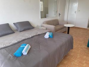 Postel nebo postele na pokoji v ubytování Apartmány Júlia