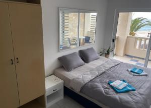 Postel nebo postele na pokoji v ubytování Apartmány Júlia
