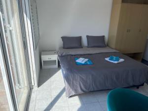 Postel nebo postele na pokoji v ubytování Apartmány Júlia
