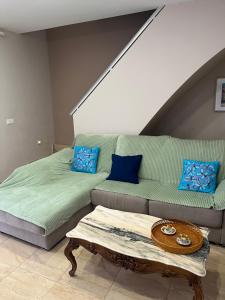 a living room with a couch and a coffee table at Cullera Mountain View in Cullera +30 photos