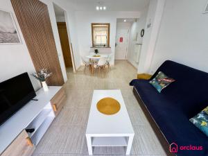 TV a/nebo společenská místnost v ubytování Ubicación ideal, relax y piscina