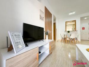 TV a/nebo společenská místnost v ubytování Ubicación ideal, relax y piscina