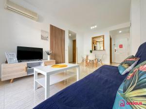 TV a/nebo společenská místnost v ubytování Ubicación ideal, relax y piscina