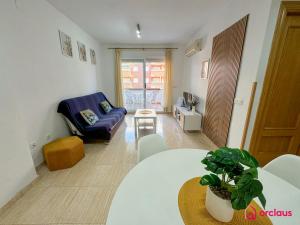 Posezení v ubytování Ubicación ideal, relax y piscina + 37 fotografií