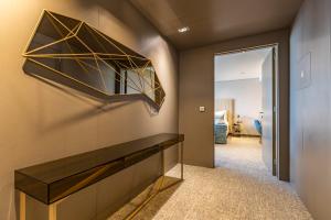 Postel nebo postele na pokoji v ubytování Montebelo Girassol Maputo Hotel