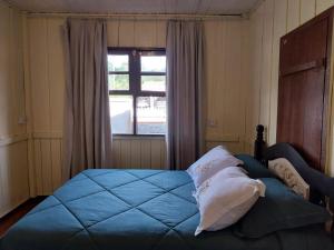 Postel nebo postele na pokoji v ubytování La Colonial I Típica Casa Serrana