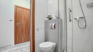 Ένα μπάνιο στο Apartament Sianożęty Dominikana 11