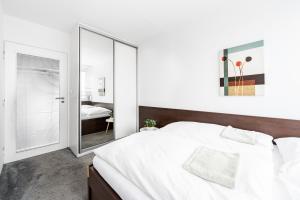 Posteľ alebo postele v izbe v ubytovaní Family apartment Prague