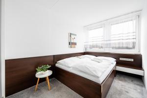 Posteľ alebo postele v izbe v ubytovaní Family apartment Prague