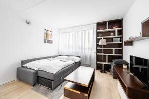 Posteľ alebo postele v izbe v ubytovaní Family apartment Prague