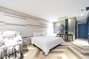 Letto o letti in una camera di Hotel ON