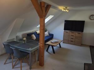 TV a/nebo společenská místnost v ubytování Gäste- und Monteurwohnung in Osterburg mit AC