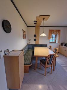 Posezení v ubytování Apartment Weitblick + 18 fotografií