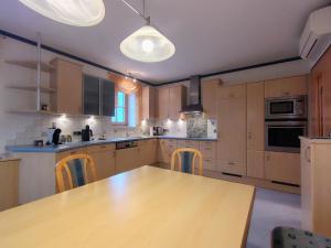 Kuchyň nebo kuchyňský kout v ubytování Apartment Weitblick