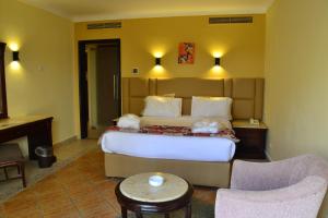 Postel nebo postele na pokoji v ubytování Royal Regency Club - Ultra All Inclusive