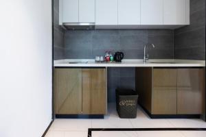 Köök või kööginurk majutusasutuses Huizhou Xunliao Bay Qingpu Hotel