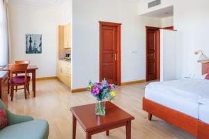 Posteľ alebo postele v izbe v ubytovaní Hapimag Apartments Prague