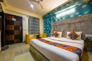 Postel nebo postele na pokoji v ubytování Hotel Classic Plaza At Delhi Airport