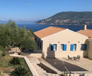 a house with a view of the ocean at Villa Sasà in Fiskardo +72 photos