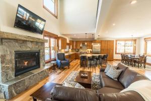 a living room with a couch and a fireplace at Mountain Lodge Oasis w Hot Tub-Rio Grande Trail in Carbondale