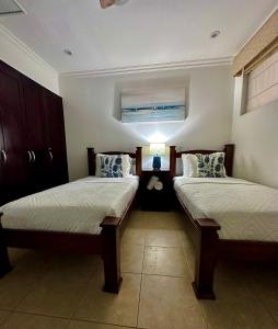 Voodi või voodid majutusasutuse Condo at Reserva Conchal toas