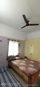 Postel nebo postele na pokoji v ubytování Shree chendur Residency ROOMS