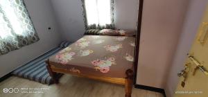 Postel nebo postele na pokoji v ubytování Shree chendur Residency ROOMS