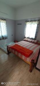 Postel nebo postele na pokoji v ubytování Shree chendur Residency ROOMS