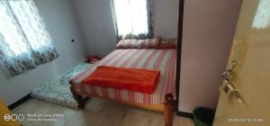 Postel nebo postele na pokoji v ubytování Shree chendur Residency ROOMS