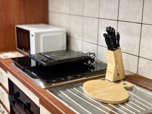 A cozinha ou kitchenette de NewDesign - Apartment in the Heart of Sassari