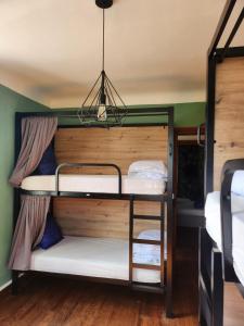 Giường trong phòng chung tại Gite Compostella