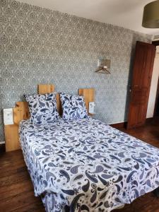 Giường trong phòng chung tại Gite Compostella