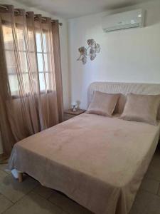 Una cama o camas en una habitación de Funtanella II 15 fotos más