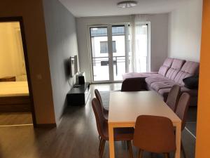A television and/or entertainment centre at Ádám Guesthouse I.