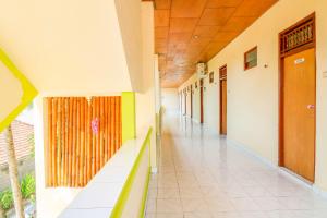 Fotografie z fotogalerie ubytování OYO 2184 Nan Berlian Inn v destinaci Legian