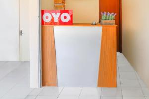 Certifikát, hodnocení, plakát nebo jiný dokument vystavený v ubytování OYO 2184 Nan Berlian Inn