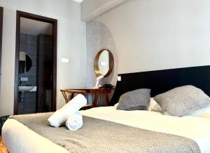 Postelja oz. postelje v sobi nastanitve Kavenue Family Suite by CSE