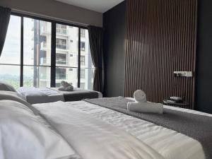 Postelja oz. postelje v sobi nastanitve Kavenue Family Suite by CSE