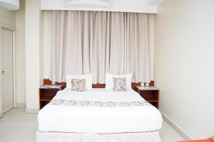 Letto o letti in una camera di Palette Muscat Al Bayrahaa