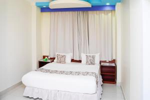 Letto o letti in una camera di Palette Muscat Al Bayrahaa